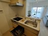 エクセレンス町屋駅前　当社のグループ会社保有住戸 人気の対面式システムキッチンを採用。食洗器も完備しています。
