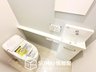 黒川町（小野駅） 3180万円 現地写真（トイレ） 汚れてもサッとひと拭きでお手入れ簡単、エコ仕様の温水洗浄便座付きのトイレです。 バリアフリーにも配慮しています。