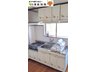湯田マンション 小窓があり、明るく清潔感のあるキッチン