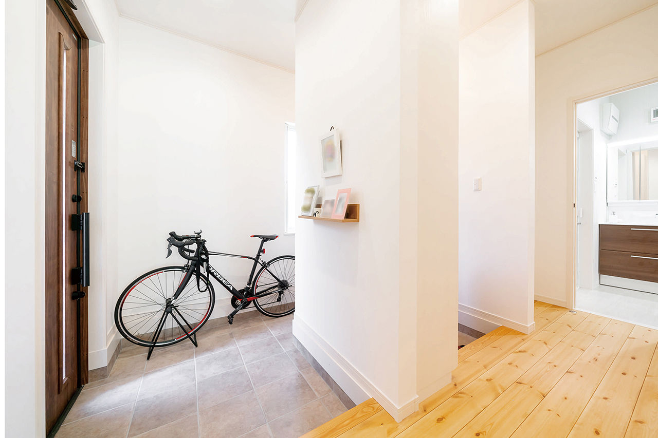 吹抜けの家  福山住宅 【北摂/2000万円台/土地探し】考え抜かれたシンプルな動線が家族の時間を生み出す無垢の家の建築実例画像3