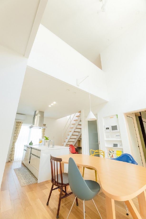 吹抜けの家  福山住宅 【阪神間/吹抜け/間取り有】家族をつなぐ吹抜けとテラス土間があるコの字の家の建築実例画像1