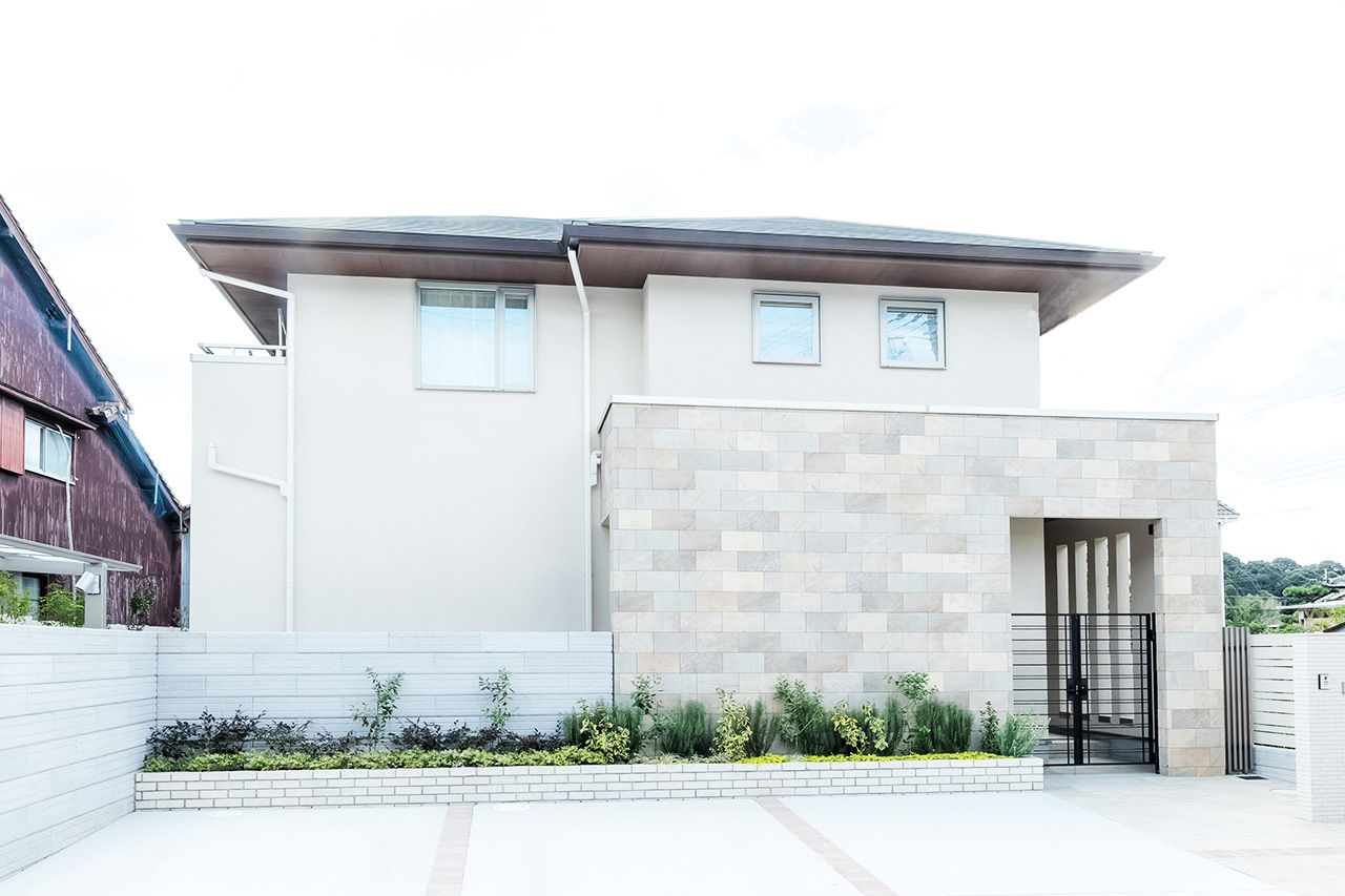 吹抜けの家  福山住宅 【阪神間/吹抜け/間取り有】家族をつなぐ吹抜けとテラス土間があるコの字の家の建築実例画像2