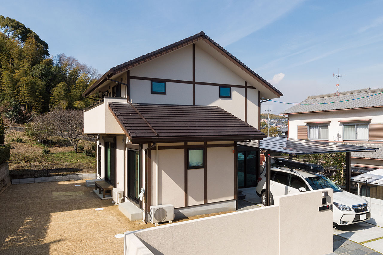 吹抜けの家  福山住宅 【京都/2000万円台/土地探し/間取り有】無垢の木が心地好いリビング。アンティークな和モダンの家の建築実例画像7