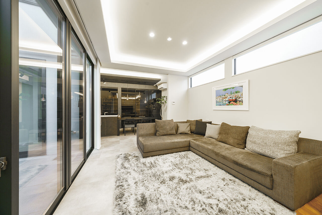 吹抜けの家  福山住宅 【北摂/3000万円台/土地探し】愛犬と安全に遊べる、癒しのセンターコートがある家の建築実例画像3