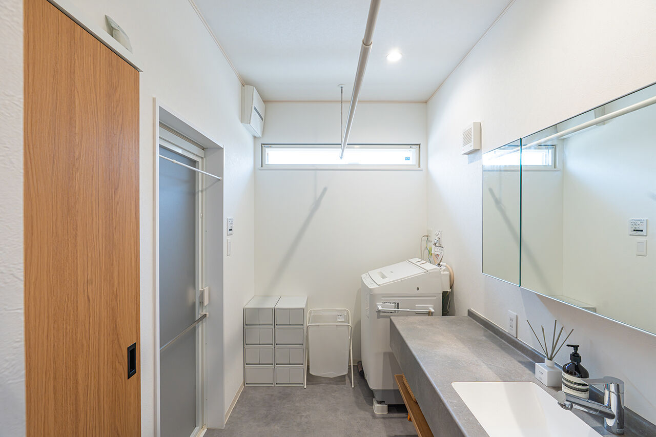 吹抜けの家  福山住宅 【北摂/2000万円台/土地探し】趣味と暮らしを結ぶ間取りと、家事がはかどる動線の家の建築実例画像7