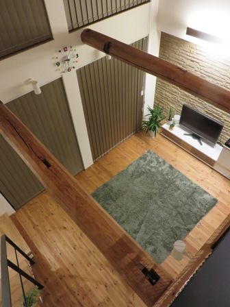 秀光ビルド 【1000万円台/延床面積30坪台/最高の間取り/リビング階段】勾配天井の吹抜けに無垢の梁や外観が映える家の建築実例画像2