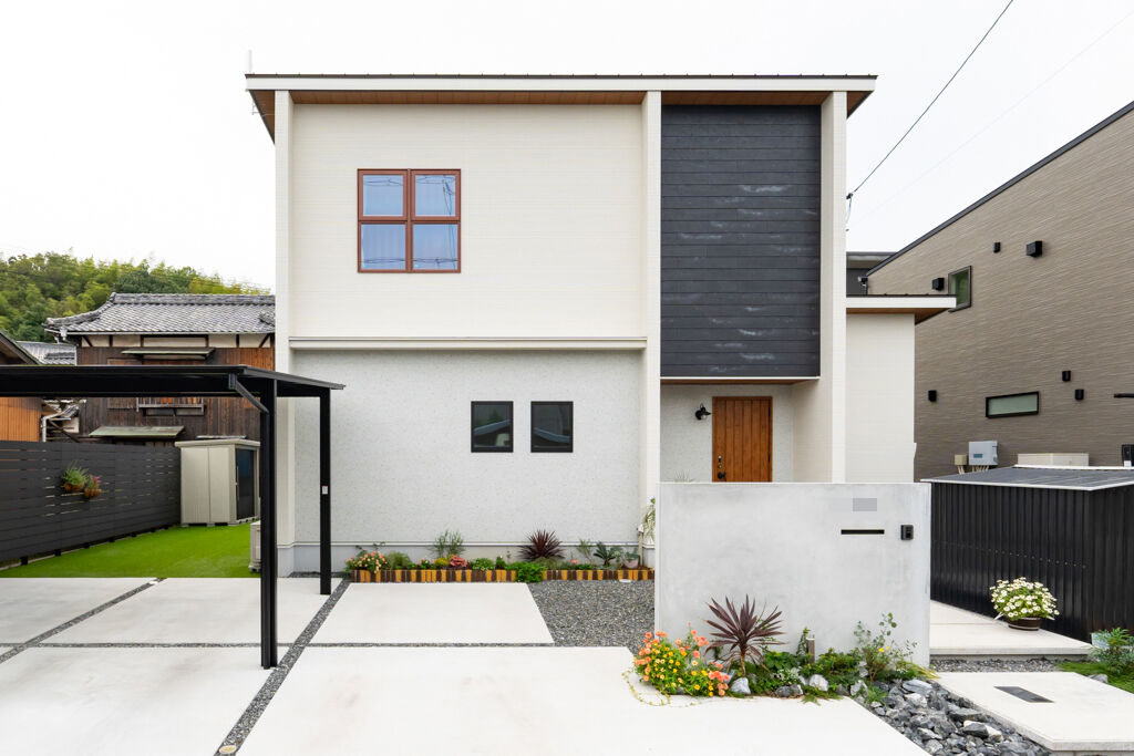 秀光ビルド 【一戸建て/吹抜け】ヴィンテージ風に仕上げた、温もりと開放感が息づく洗練された空間が広がる2階建ての家の建築実例画像2