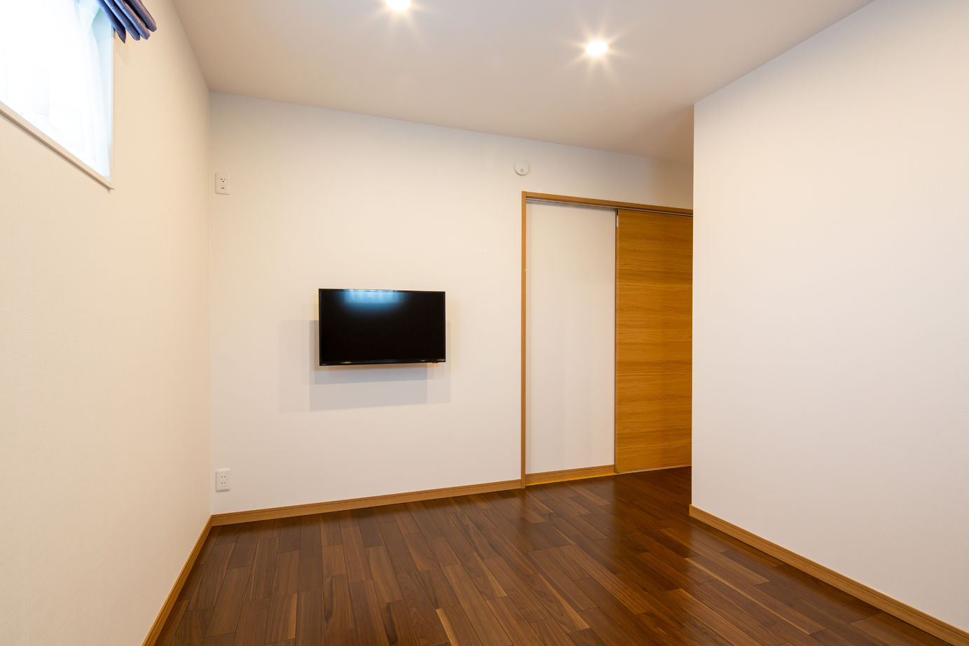 優プラン 【松本市/平屋住宅/間取り有/収納充実】開放的な間仕切れるリビング、床暖房で暖かい平屋の家の建築実例画像9