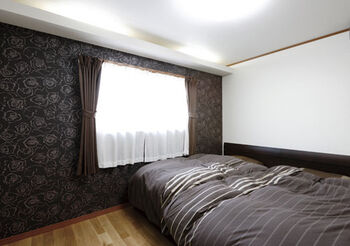 Art Yoshikawa設計事務所 吉川住建 職人技が光る手塗りの壁の畳コーナーは、家族の安らぎの空間。「和」好きが選んだ和モダンの家の建築実例画像6