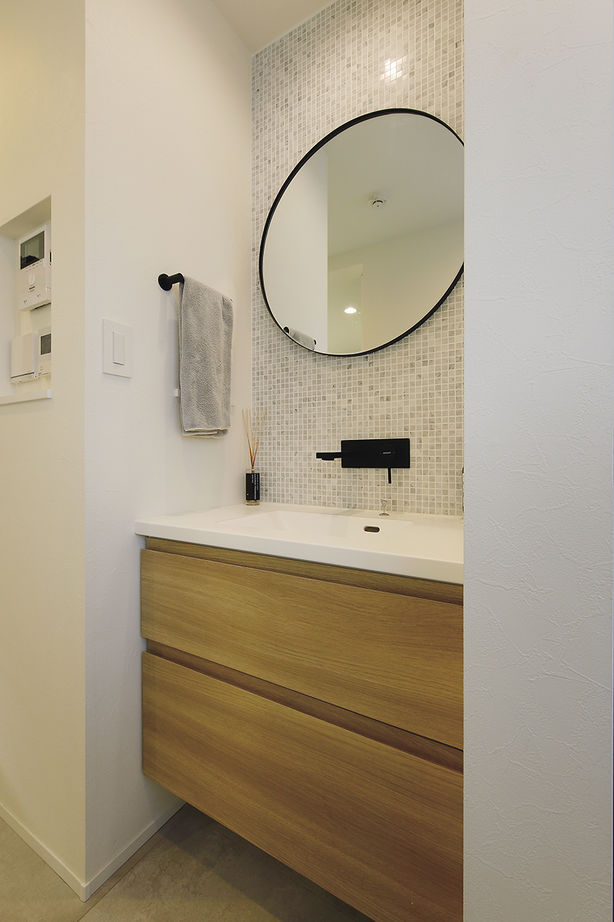 ジェネシス 【延床27.2坪/間取り図/狭小/吹き抜け/屋上/3階建て】憧れの輸入キッチンが映える開放的な広々リビングの家の建築実例画像6