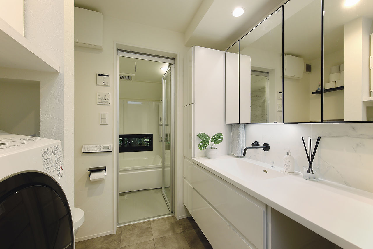 ジェネシス 【延床27.2坪/間取り図/狭小/吹き抜け/屋上/3階建て】憧れの輸入キッチンが映える開放的な広々リビングの家の建築実例画像8