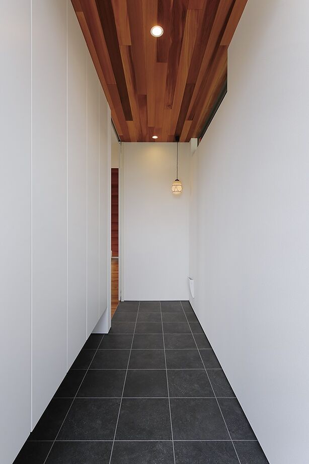 ジェネシス 【3100万円台/延床25.9坪/SE構法/間取り図】ウッドデッキにつながる窓と吹抜けのある明るいLDKの家の建築実例画像6