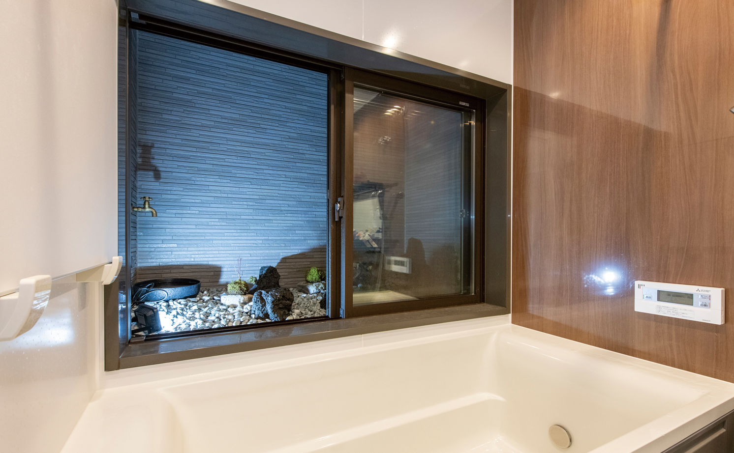 リアルホーム 【平屋/2000万円台/34坪台】エアコン一台で夏も冬も快適！土間収納にロフト、坪庭を設けたこだわりの平屋の建築実例画像3