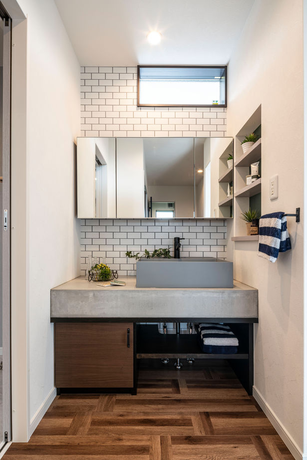 アイワホーム 【本体価格2,400万円/36.6坪/平屋】黒を基調に木目とモスグリーンの外壁をアクセントにした、ZEH仕様の平屋の住まいの建築実例画像7