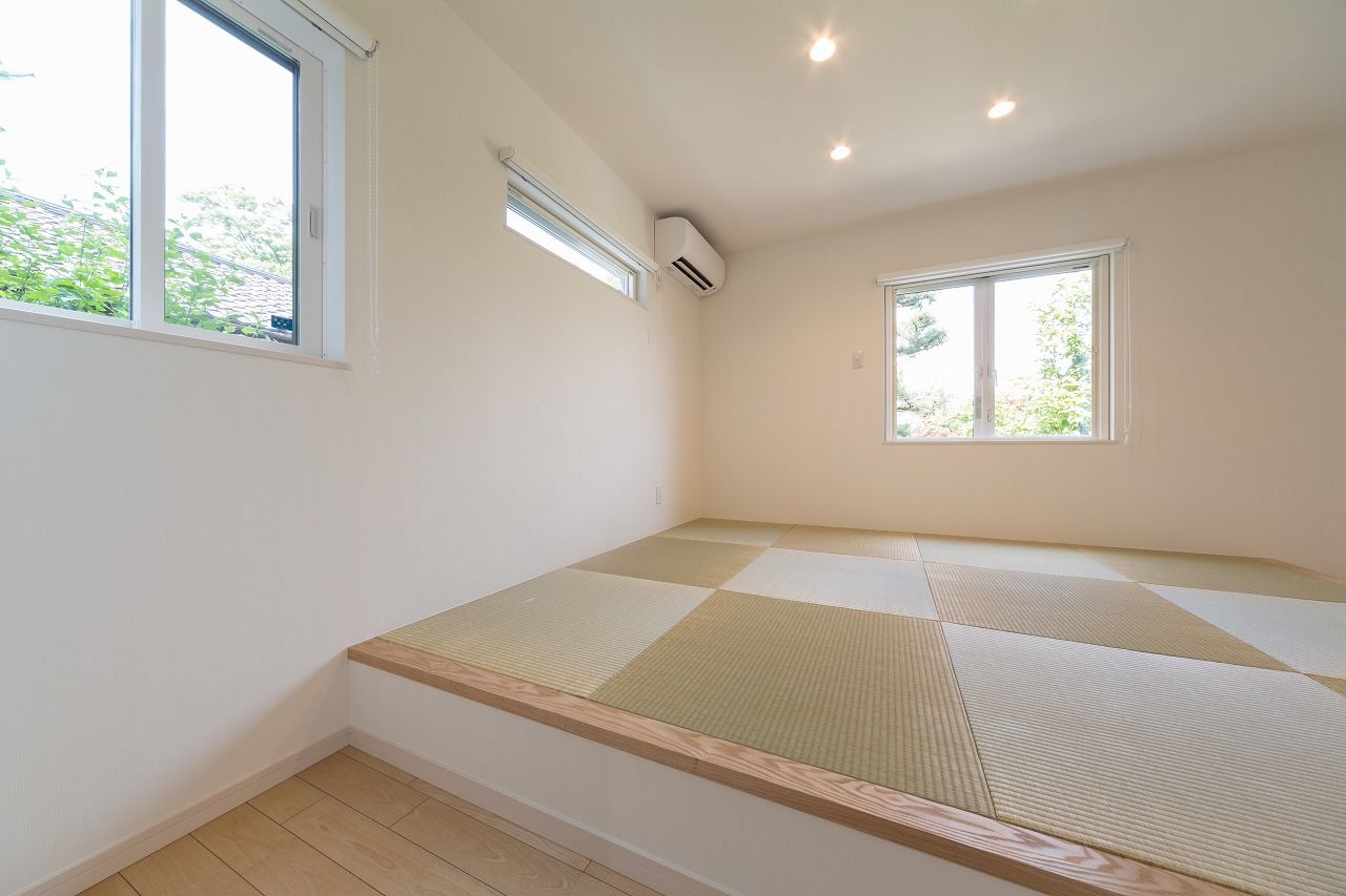 クオリティハウス／新潟材協 スキップフロアと勾配天井による“空間一体型”の家の建築実例画像4