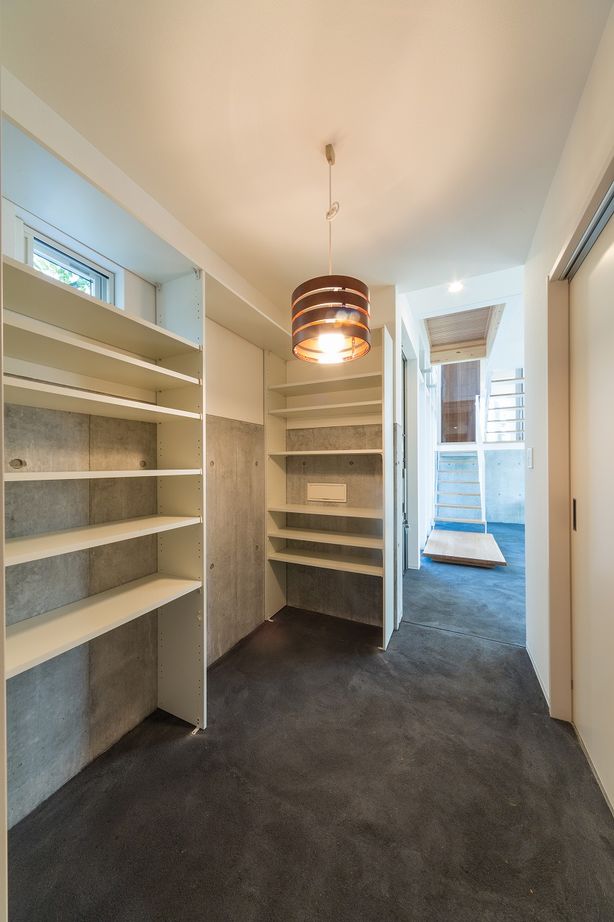 クオリティハウス／新潟材協 スキップフロアと勾配天井による“空間一体型”の家の建築実例画像8