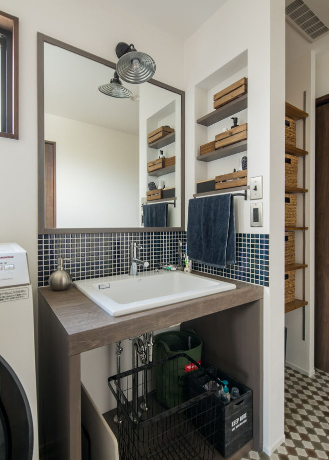 ルポハウス一級建築士事務所 【滋賀/2000万円台前半】クールな男前ガルバの家。開放感あるリビングの吹き抜けが特徴の建築実例画像7