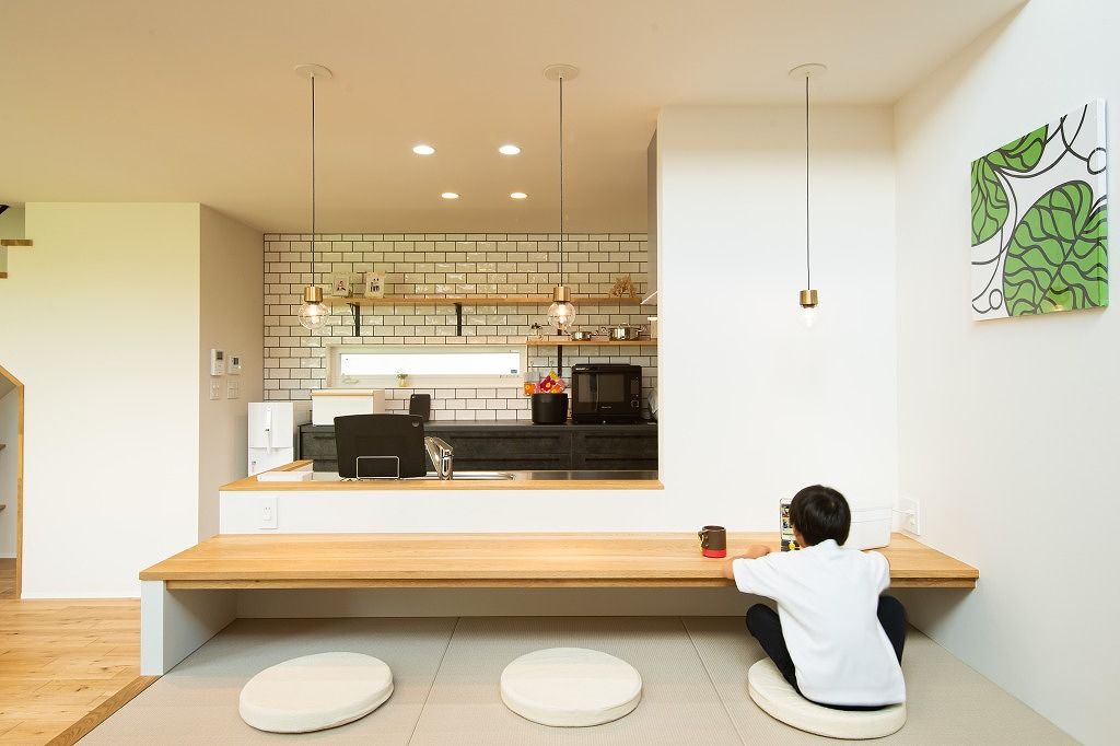 アンドクリエイト 異素材を掛け合わせた印象的なデザインのファサードと光あふれる快適な空間の建築実例画像3