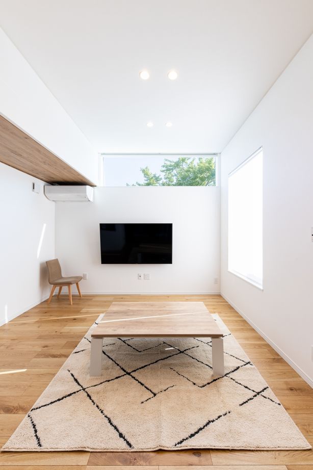 アンドクリエイト デッキ&庭へと空間が連続する、子どもたちが自由に遊べる家の建築実例画像3