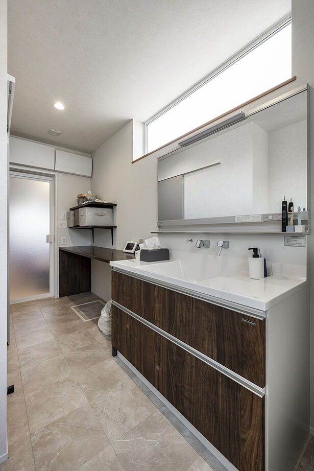 高砂建設　埼玉・東京 【練馬区/30坪台/ピットリビング/無垢材】大人数が集まっても顔が見える！ストレートに空間がつながる家の建築実例画像13