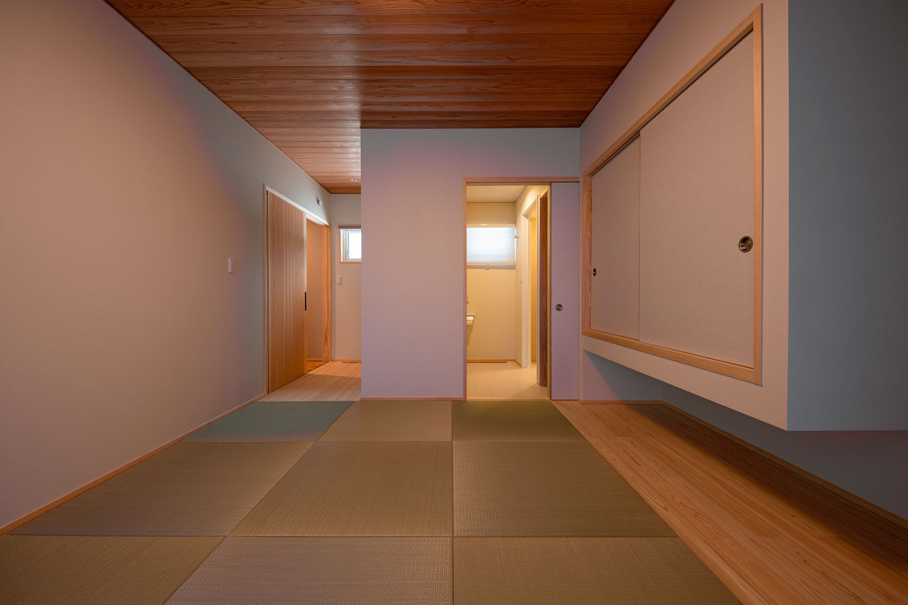 三和木 【くの字の平屋×土間×57坪】大自然、薪ストーブ、愛車と寛ぐ至福。無垢の心地よさを愉しむガレージハウスの建築実例画像10