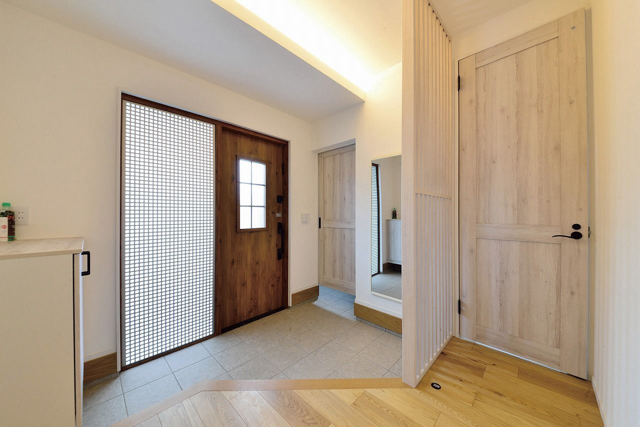 カクニシビルダー 【42坪/間取り図有】カバードポーチや庭と繋がる暮らしを実現。西海岸を彷彿とさせる爽やかな平屋の建築実例画像6