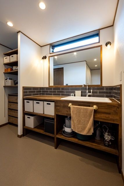 BinO太田 中村住宅工業 【LOAFER #造作洗面 #吹抜け ＃ウッドデッキ】大人の秘密基地 スコッチを味わう至福の家の建築実例画像8