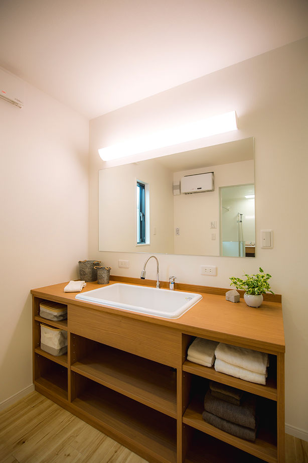 サンエルホーム 【松山市／3LDK】傾斜天井を生かした開放的な平屋風の家。1階で暮らしが完結する暮らしやすさの建築実例画像9