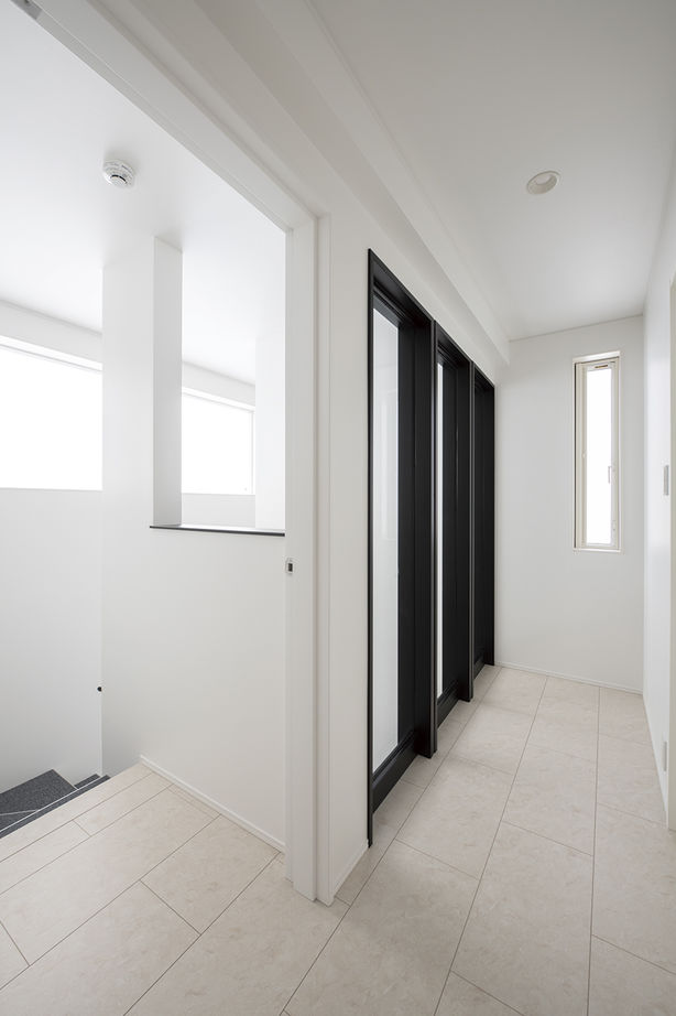 オカモトハウジング 【間取り図有/吹き抜け/ガレージ】規制があるから、名作が生まれる。準防火地域に建つ木造3階建ての大邸宅の建築実例画像6