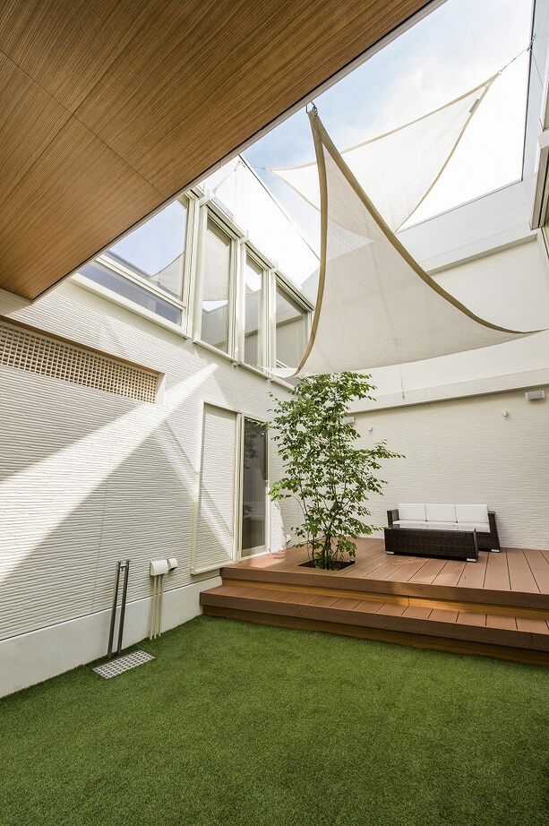 IDEAL HOME　アイデアルホーム（カスタムホーム） 【2000万円台/摂津市/ビルトインガレージ/50坪】二棟にわけた住まいの中心に中庭が、ノーカーテンの家の建築実例画像4