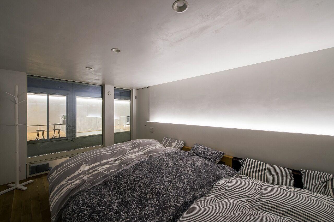 IDEAL HOME　アイデアルホーム（カスタムホーム） 【2000万円台/摂津市/ビルトインガレージ/50坪】二棟にわけた住まいの中心に中庭が、ノーカーテンの家の建築実例画像8