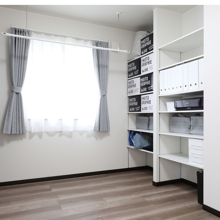 匠建(たっけん）コーポレーション 【札幌市　32.44坪　４人家族　全室床暖房】アイデア収納で室内すっきり。インテリアの色合いもモダンな家の建築実例画像5