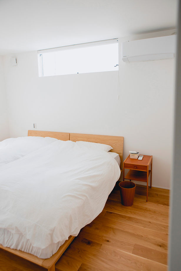 ALTS DESIGN OFFICE（アルツ　デザイン　オフィス） ≪滋賀県/間取り図有≫お気に入りの絵画が映える美術館のような玄関ホールとコンクリート土間がある住まいの建築実例画像14