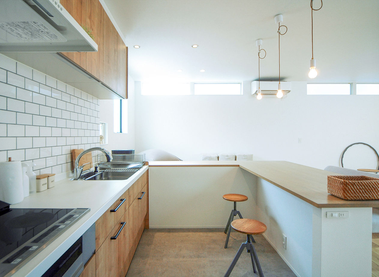 TIME+ 【プライベートと採光を重視した平屋】光庭が空への開放感を生み出す、アーバンスタイルのフラットハウスの建築実例画像6