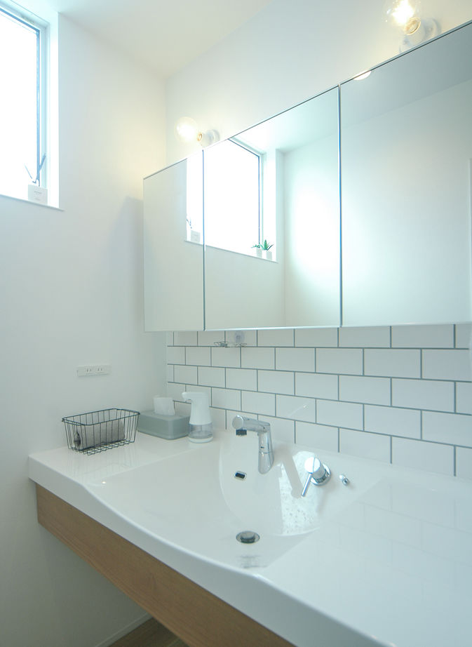 TIME+ 【プライベートと採光を重視した平屋】光庭が空への開放感を生み出す、アーバンスタイルのフラットハウスの建築実例画像13