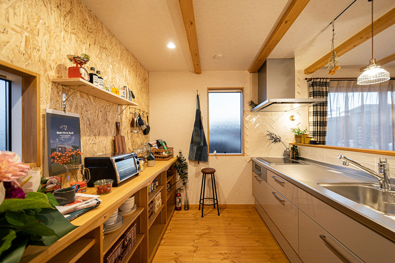 パルコホーム 【間取り図有/アウトドア派】薪ストーブのある吹き抜けリビングやウッドデッキなど自由に楽しめる住まいの建築実例画像4