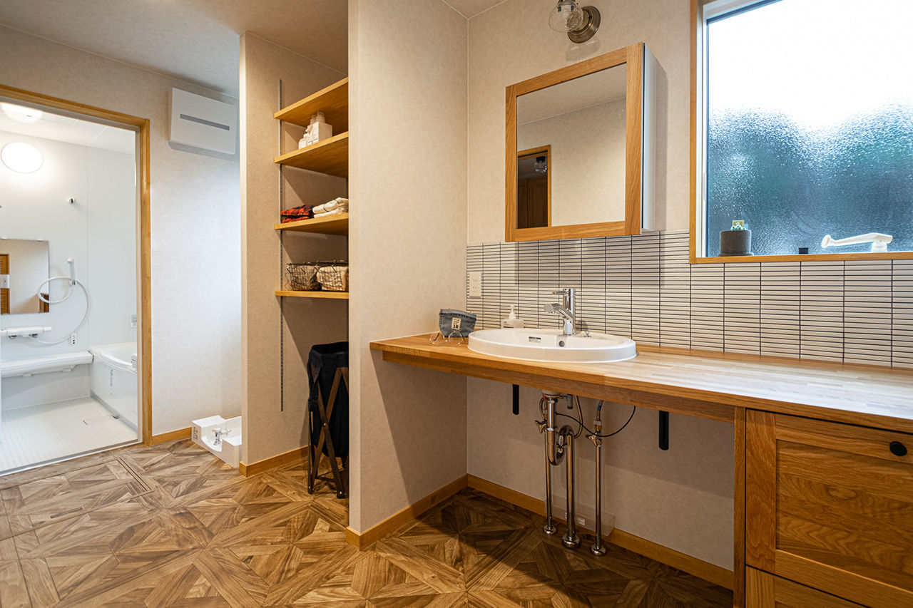 パルコホーム 【間取り図有/アウトドア派】薪ストーブのある吹き抜けリビングやウッドデッキなど自由に楽しめる住まいの建築実例画像9