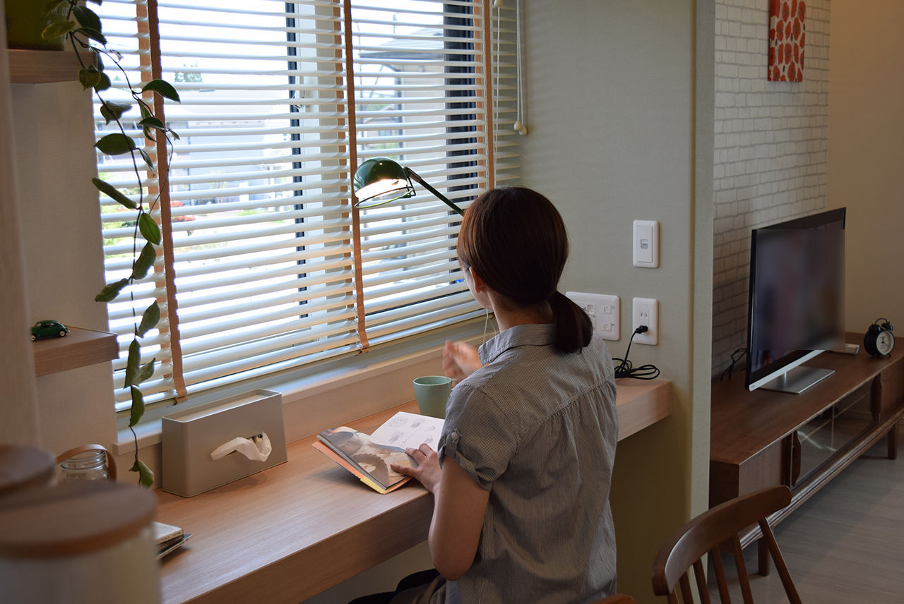 パルコホーム 家族団らんが弾む工夫が随所に。空間がつながるスキップフロアとガレージのある家の建築実例画像3