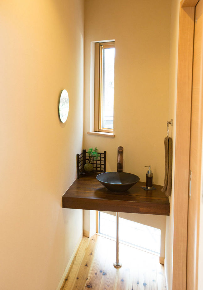 新進建設 【2500万円】扇型の土地をいかした、庭を抱いて「くの字」に建つ家／家の間取り図ありの建築実例画像7