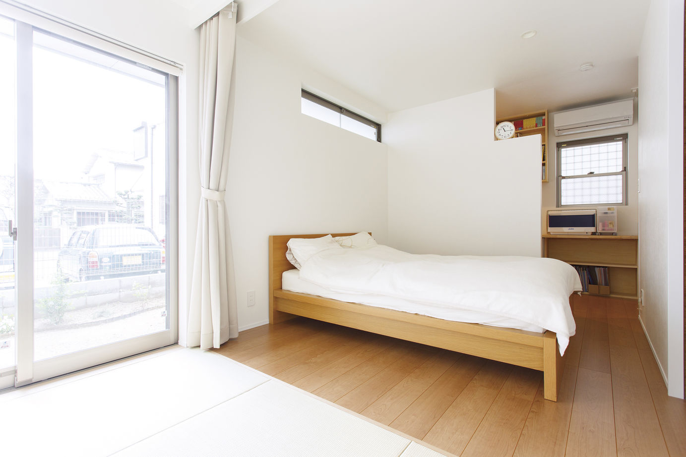 一級建築士事務所　福島工務店 【大阪府/ビルトインガレージ/30坪/3階建て】SE構法で実現した中庭付き・吹き抜けで光の入る開放的な空間の建築実例画像6