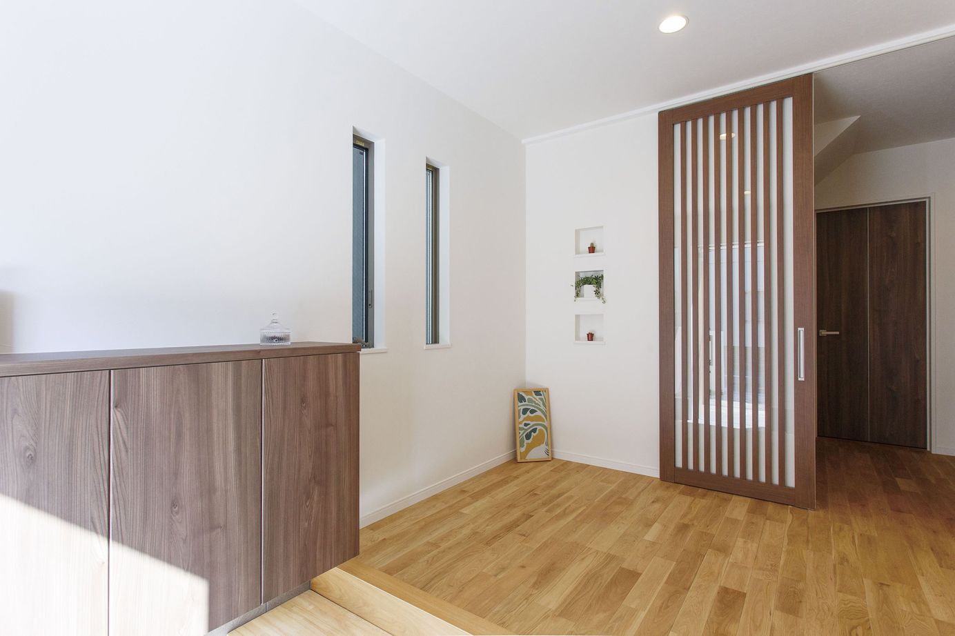 一級建築士事務所　福島工務店 【大阪府大阪市/2000万円台/3階建て/車二台駐車可】広いバルコニーと吹抜けからの採光が◎な三階建ての実例の建築実例画像6