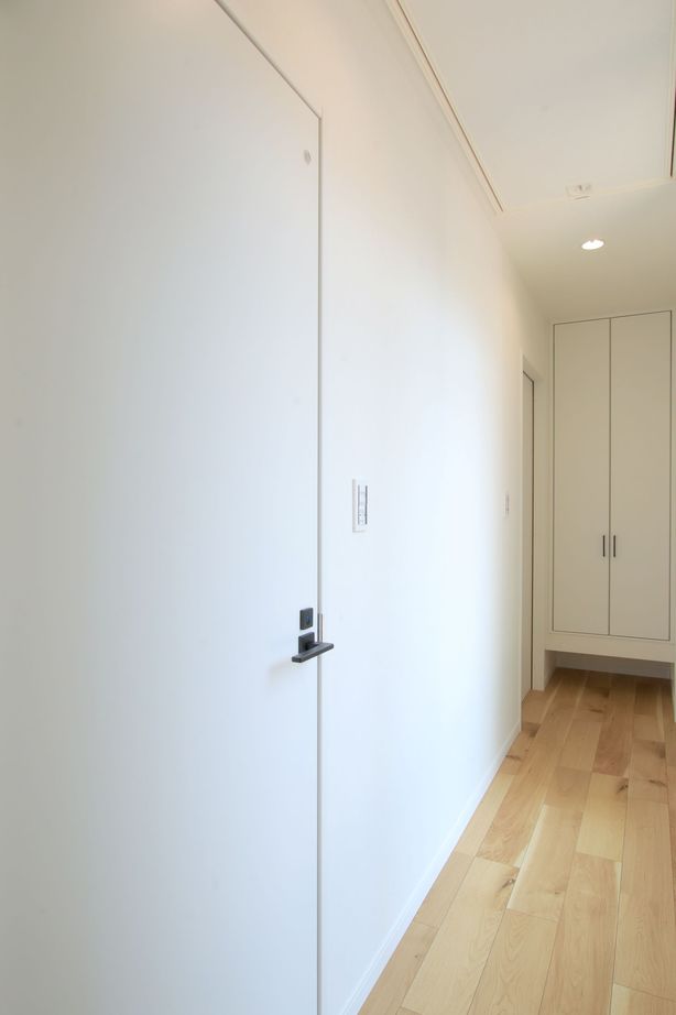 一級建築士事務所　福島工務店 【大阪市/二世帯住宅/ビルトインガレージ/車2台/３階建て】SE構法で開放的な吹抜けと中庭バルコニーを実現の建築実例画像8