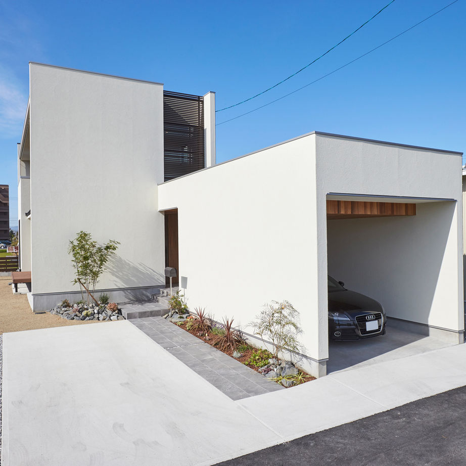 チェックハウス 【30坪台/ガレージハウス】質感を生かすシンプルデザイン。吹き抜けリビングで明るさ十分なガレージハウスの建築実例画像4