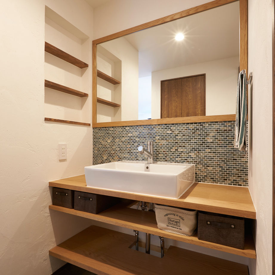 チェックハウス 【30坪台/ガレージハウス】質感を生かすシンプルデザイン。吹き抜けリビングで明るさ十分なガレージハウスの建築実例画像6