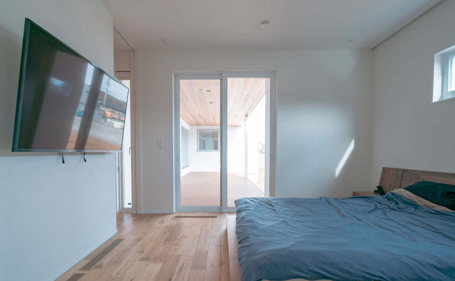 チェックハウス 【平屋/3000万円台/30坪台/コの字】自然素材のシンプルな平屋「全館空調で開放的な空間でも家じゅう快適」の建築実例画像7