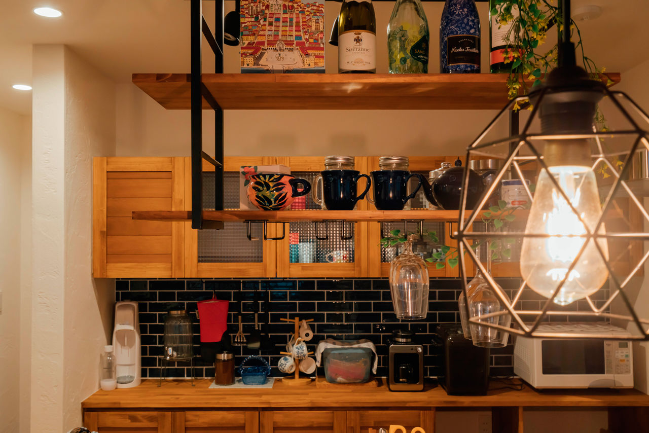 チェックハウス 【平屋×２階建て/店舗併用/4LDK】カフェのような動物病院「家で火を見ながらワインを飲む時間が幸せです」の建築実例画像3