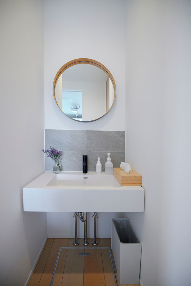 チェックハウス 【平屋/ガレージハウス/40坪台】開放的でのどかな景色に癒される。インナーガレージのある生活感のない平屋の建築実例画像9