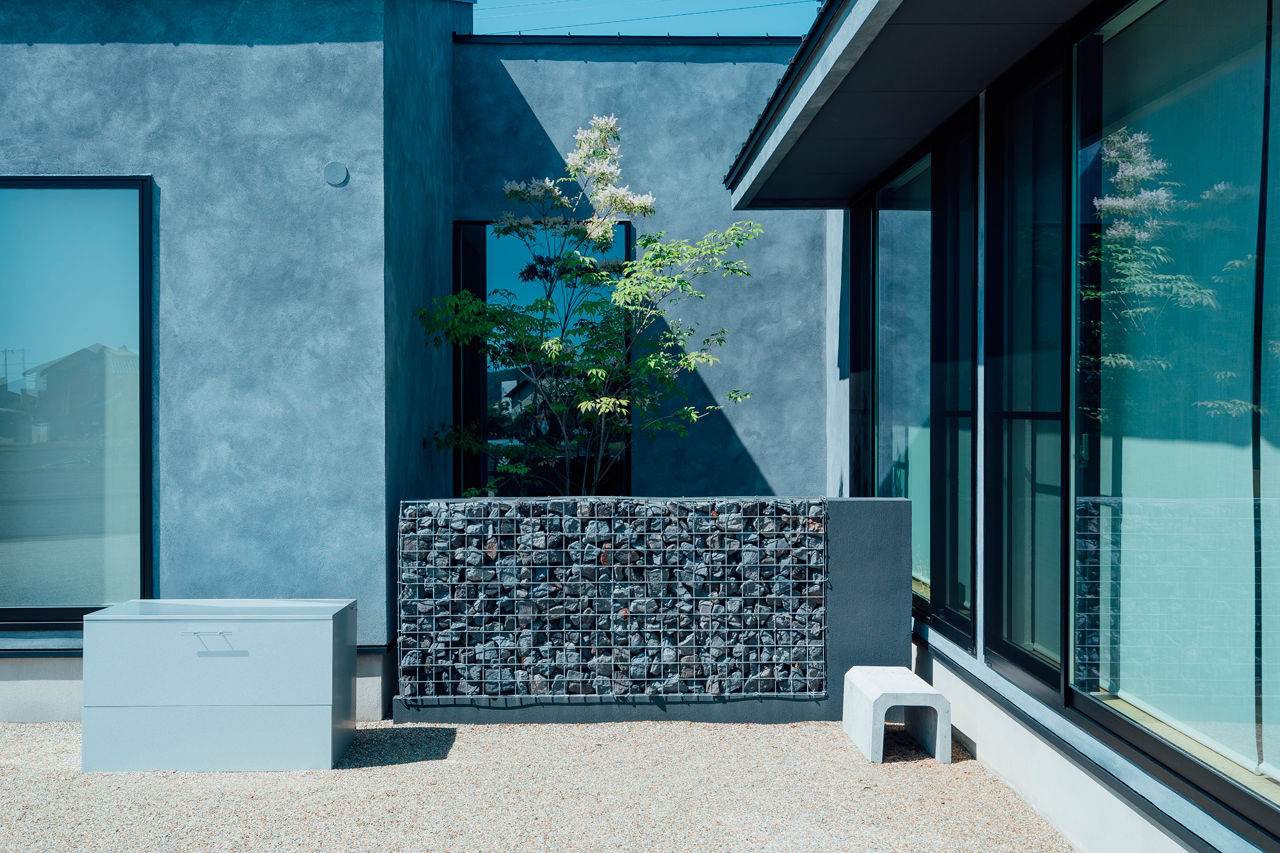 チェックハウス 【平屋/32坪/コンパクトでも開放感】ムラのある外観がかっこいい。あえて建物をナナメに配置した理由とは？の建築実例画像10