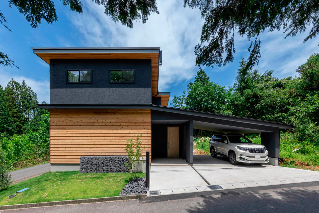 チェックハウス 【ガレージハウス/平屋風の暮らし】５ｍ超の吹抜も全館空調で快適！平屋？２階建て？２つの表情がある家の建築実例画像2