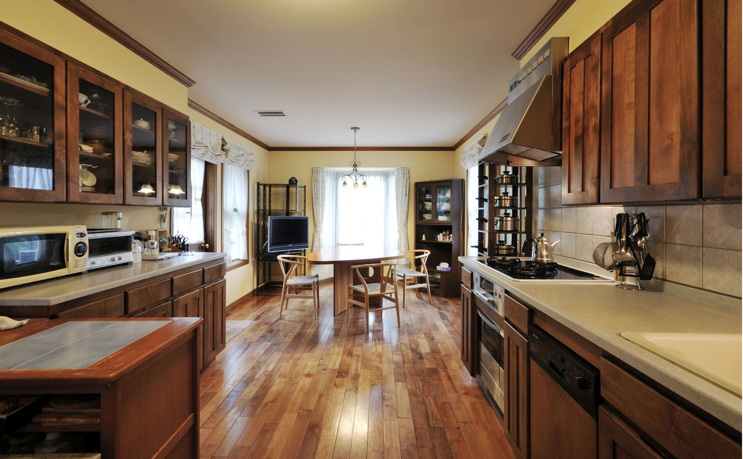 ニットーホーム グランドピアノのあるゆったりとした輸入住宅。大きな煙突のあるノースカントリーの建築実例画像5